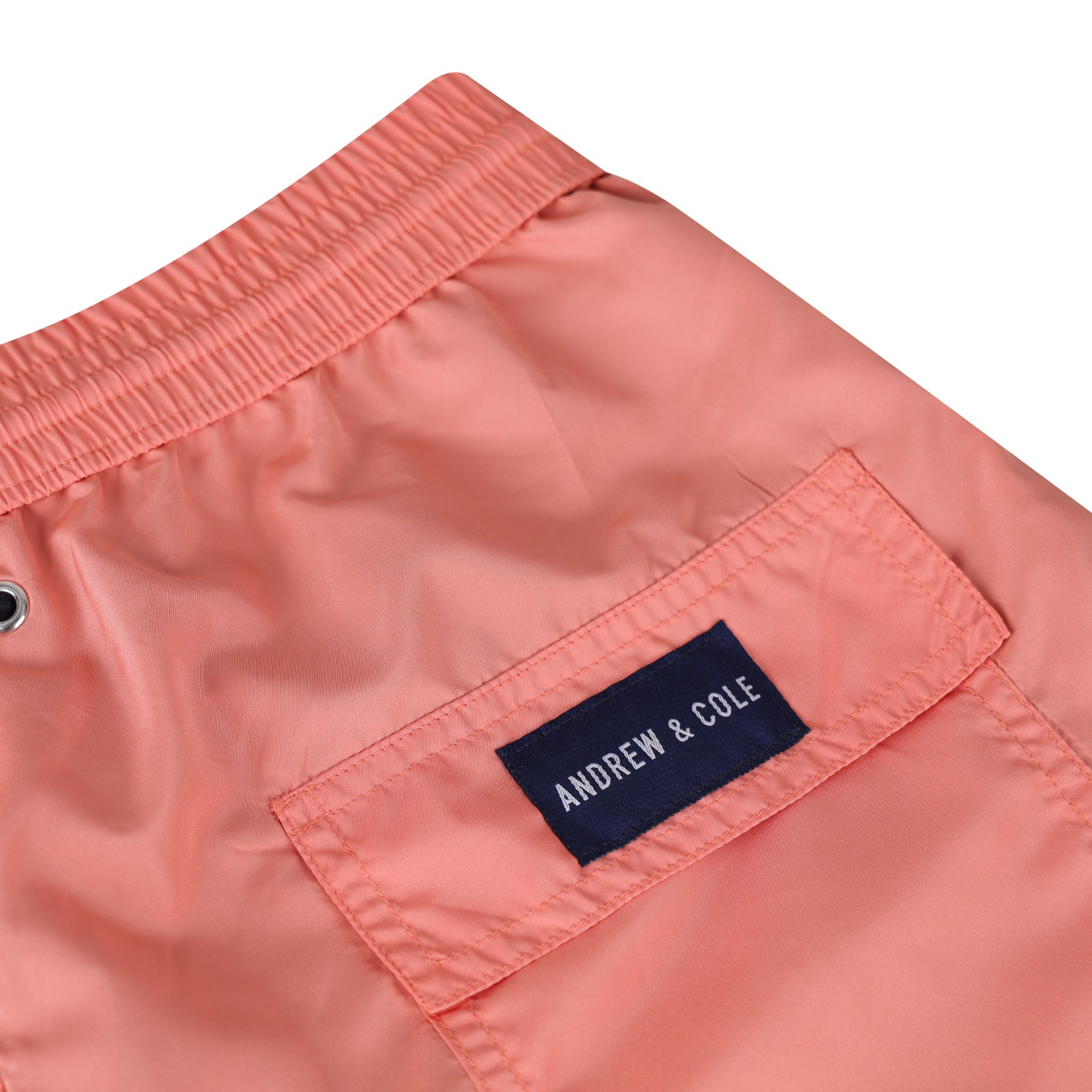 Coral Badeshorts Nahansicht mit Logo Andrew&Cole